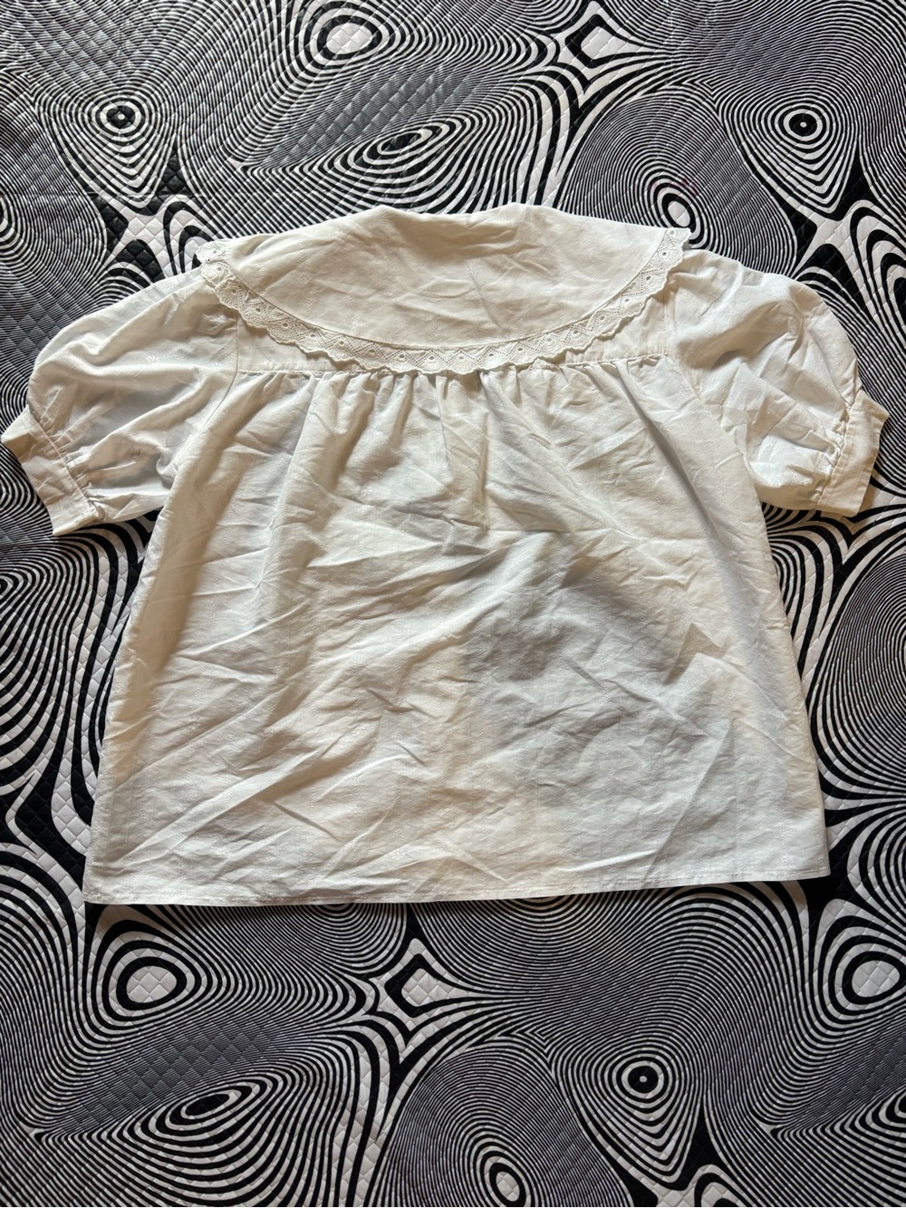 White Short-Sleeve Button-Up Top with Blue Floral Applique - Picture 5 of 6